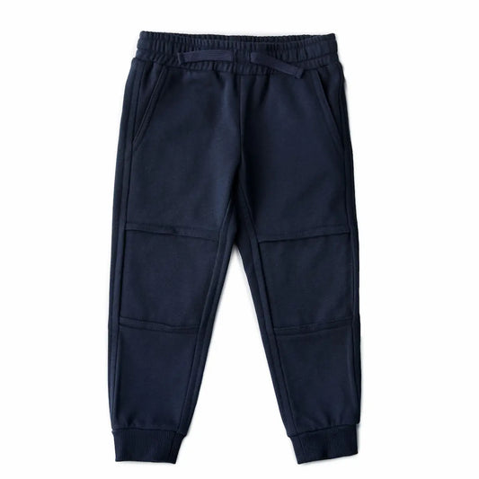 Chakiboo RenewaKnee™ navy kids' jogger showing the double-layer knee panel from the outside